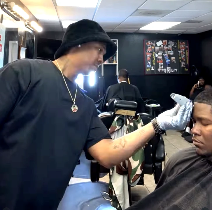 Barber with clippers